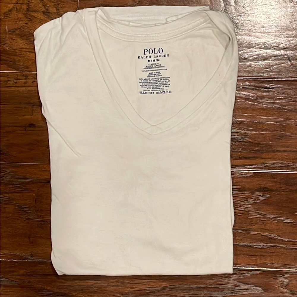 Polo v-neck. Size M, classic fit. Never worn.